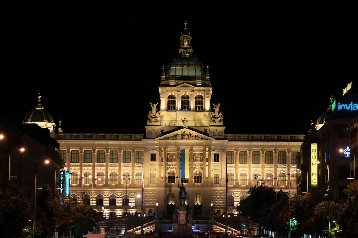 Evening lights illuminate the National Museum building at Wenceslas Square