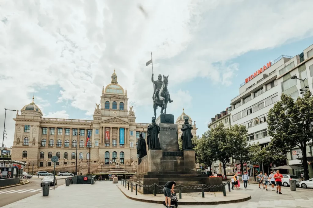 Statue of St. Wenceslas and National Museum building in daylight at Wenceslas Square