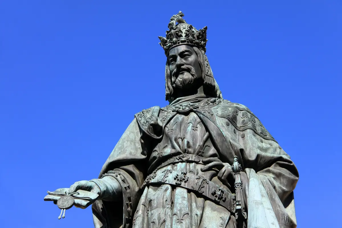 Bronze statue of Emperor Charles IV against blue sky