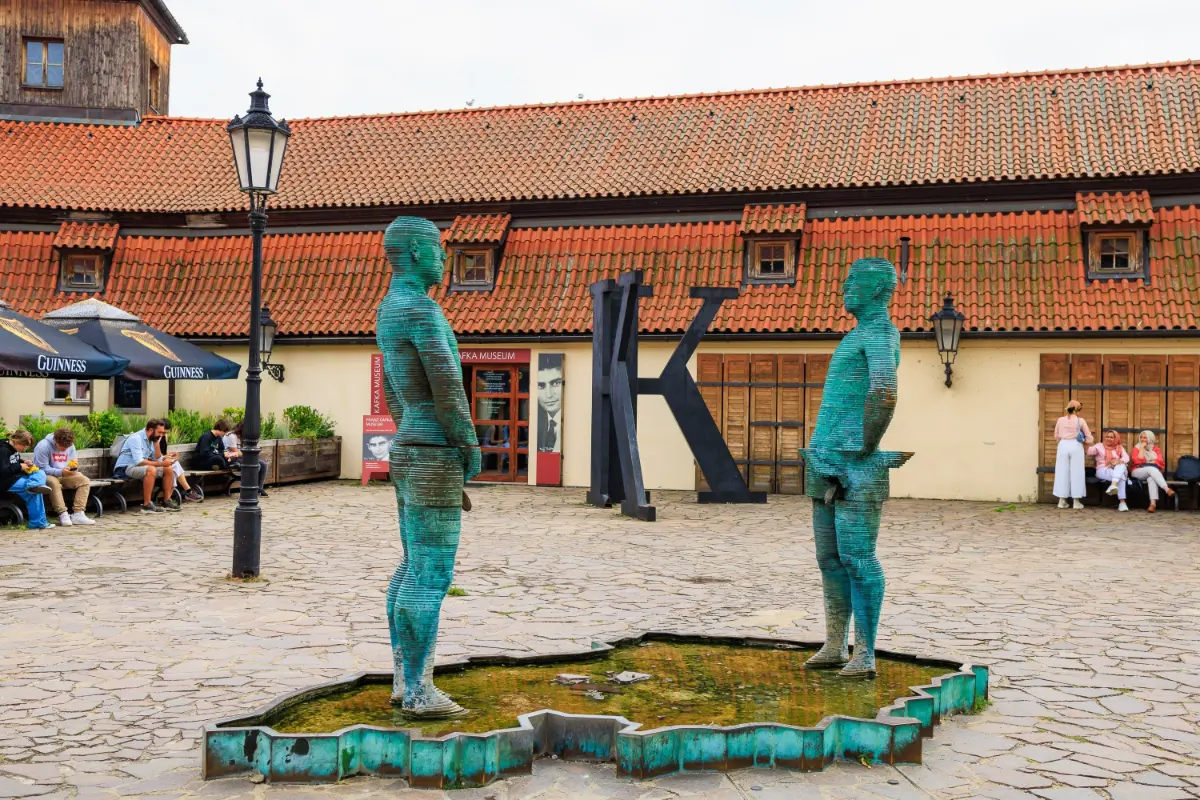 Fountain with statues at Franz Kafka Museum