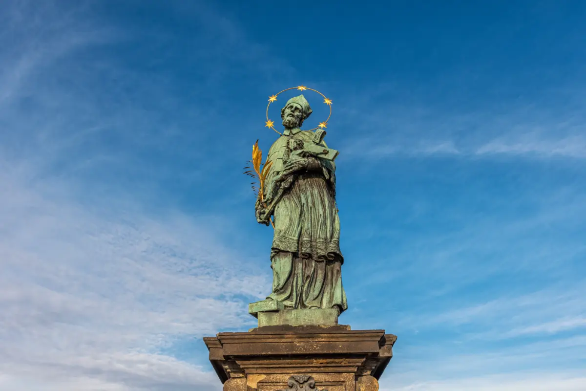 Bronze statue of John of Nepomuk on historic Charles Bridge, Prague