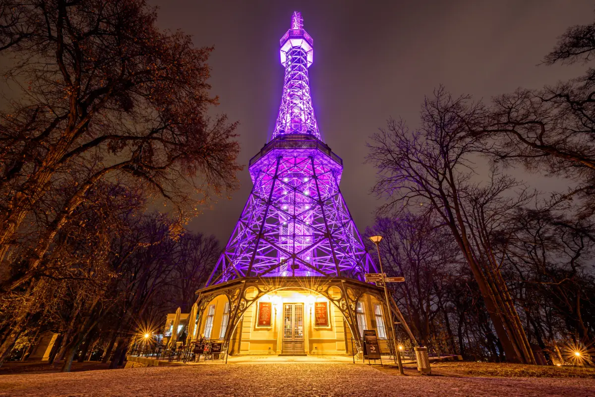 Purple-lit Petrin Tower in Prague, Lesser Town