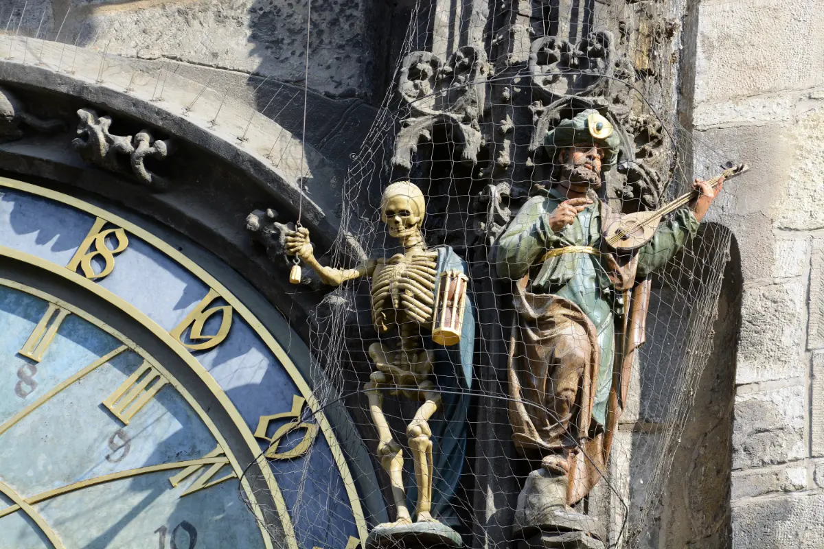 Astronomical clock in Prague with skeleton and musician virtues